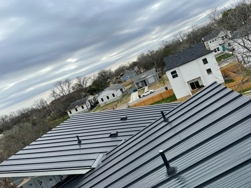 Standing seam metal roof panels with vents for Skylight Repair in Champion Heights